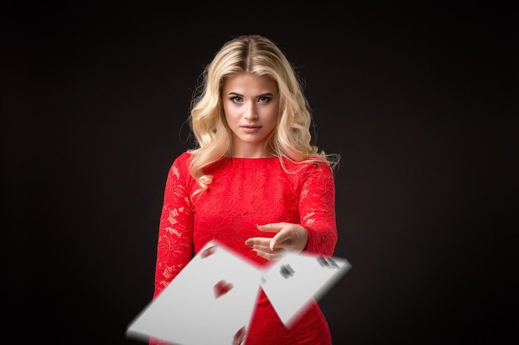 Professional live dealer hosting blackjack table with real-time video streaming